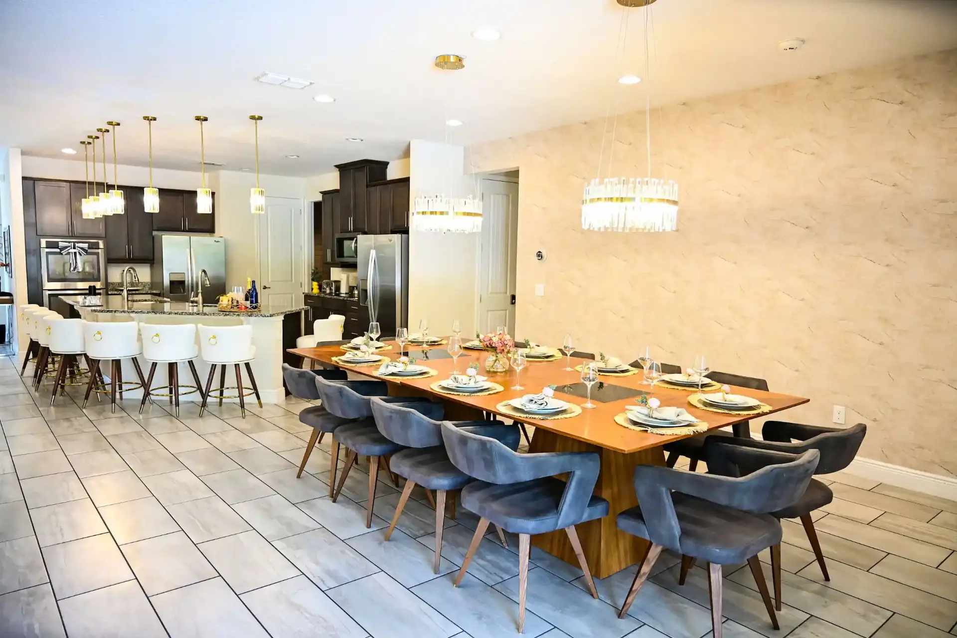 Large dining table with kitchen and bar seating