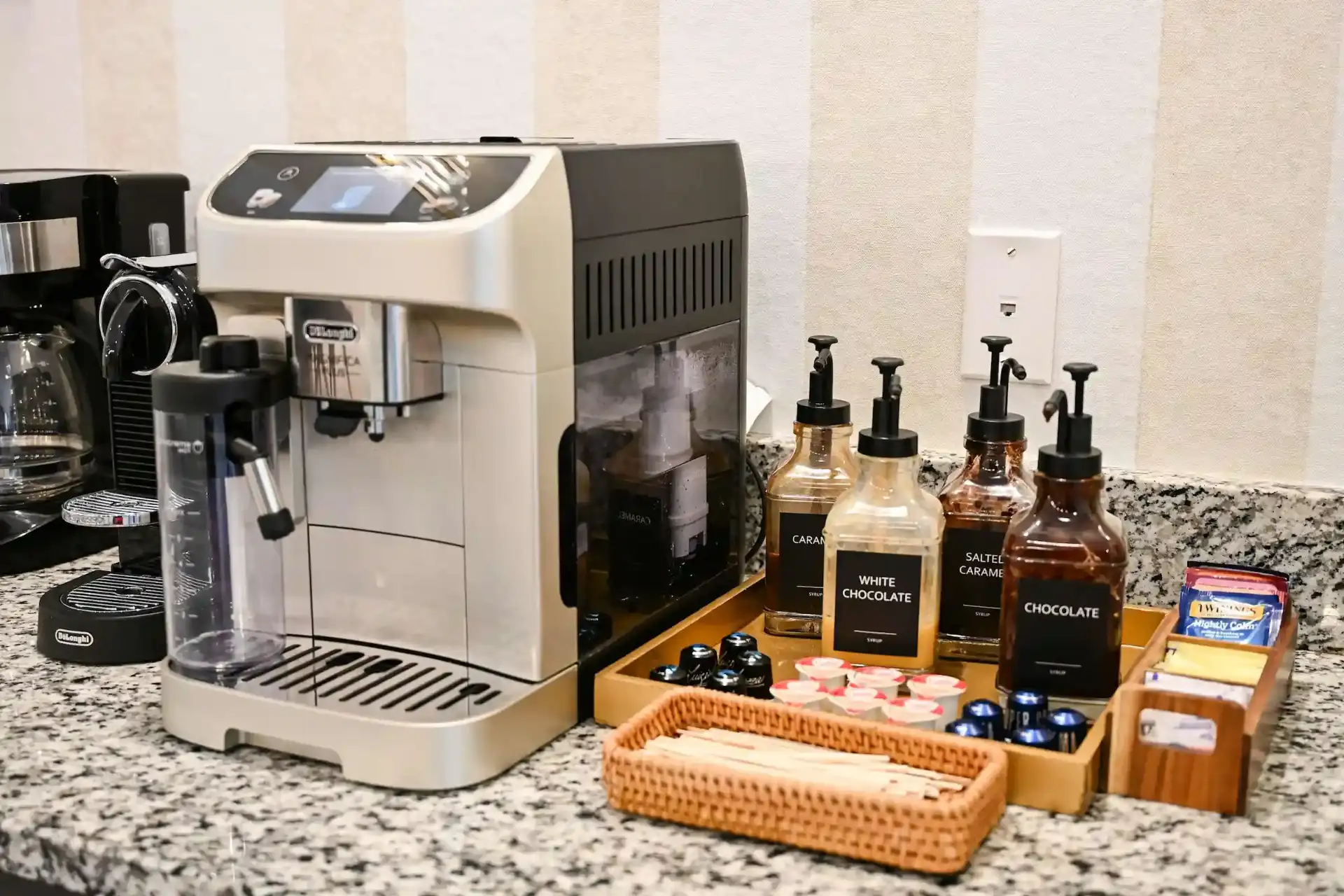 Espresso machine with caramel and chocolate syrups