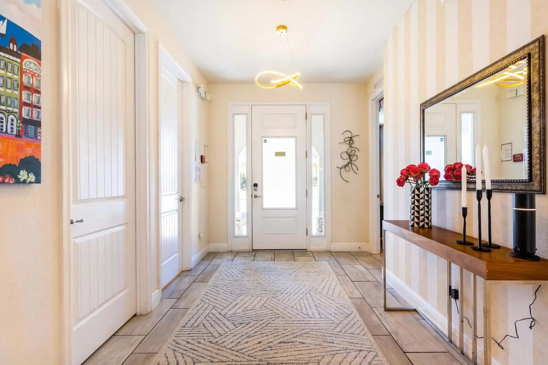 Front entrance with mirror and console table