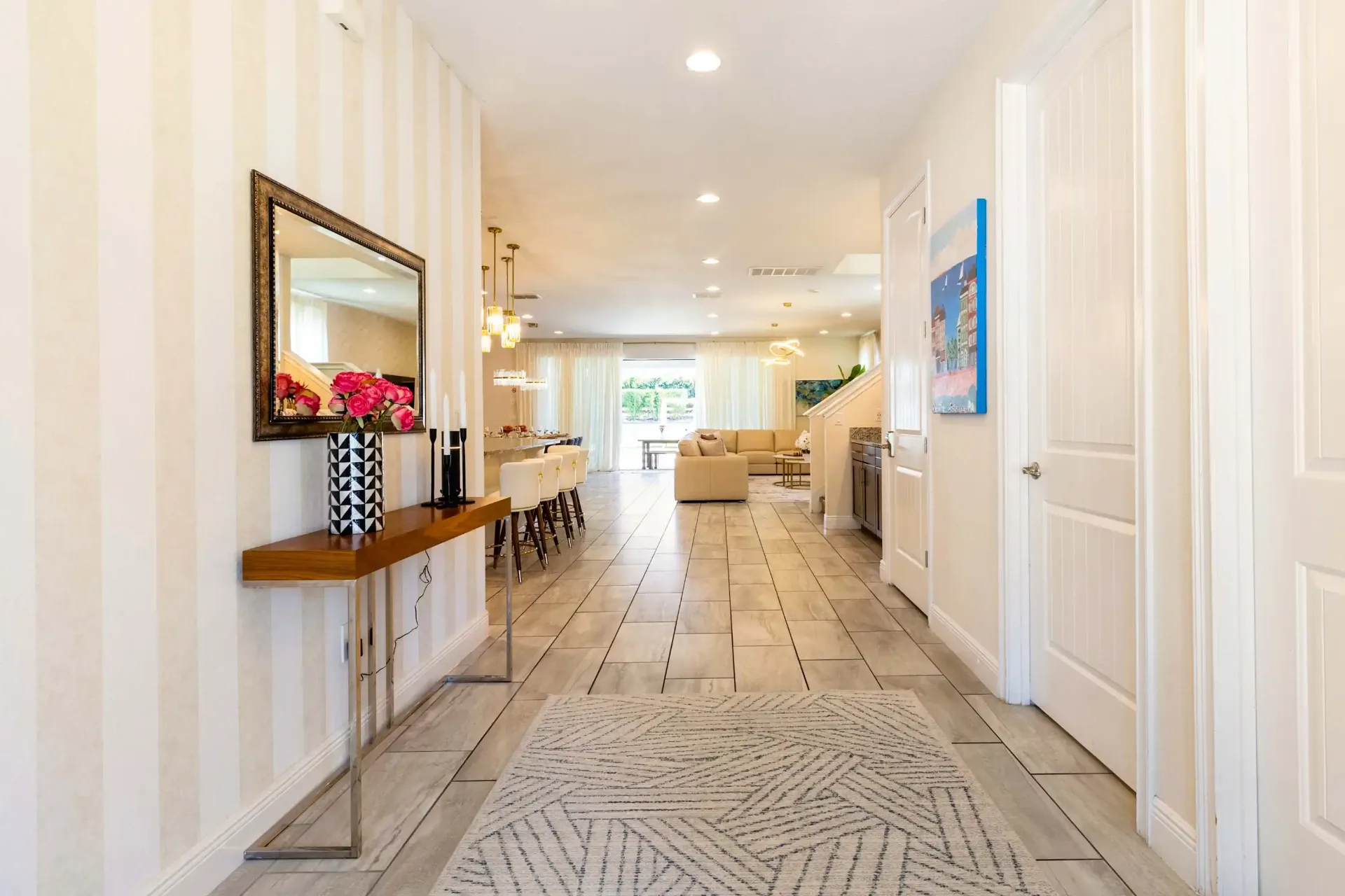 Hallway view toward open living and kitchen
