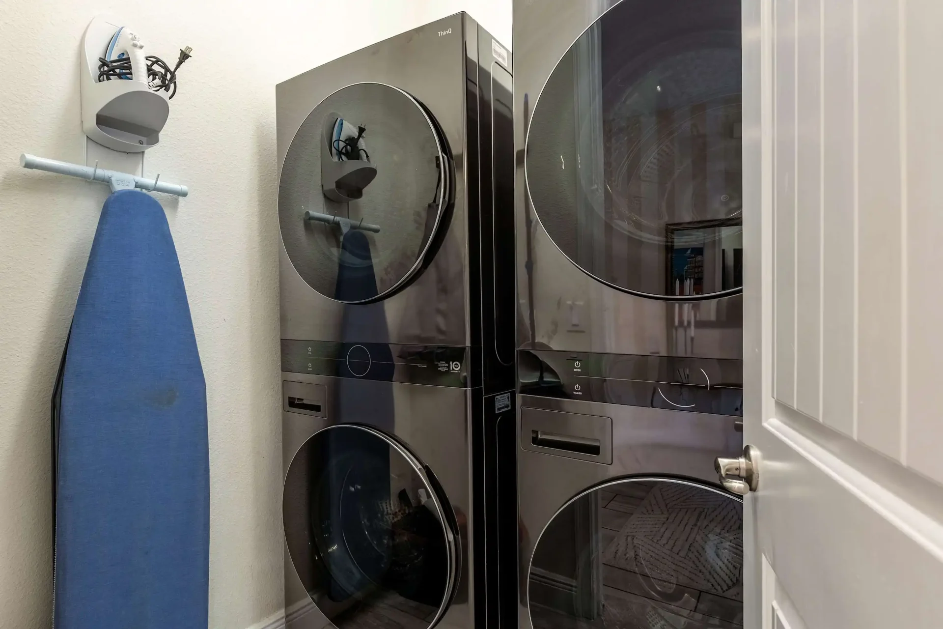 Laundry room with dual washer and dryer