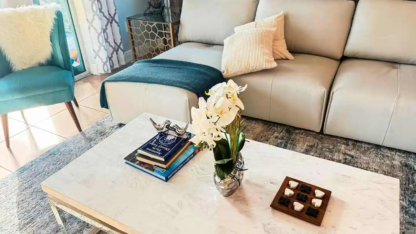 Lounge coffee table with orchids and tic-tac-toe set