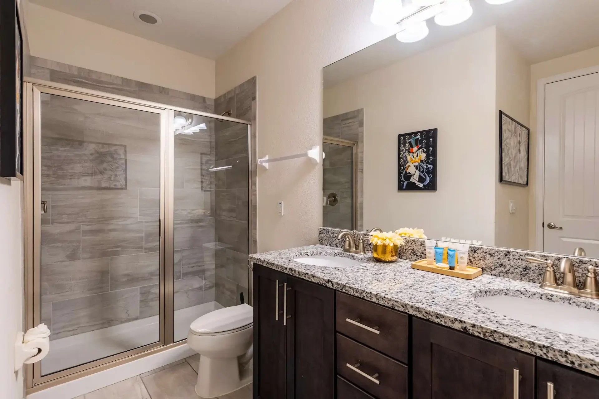 Bright bathroom with walk-in glass shower
