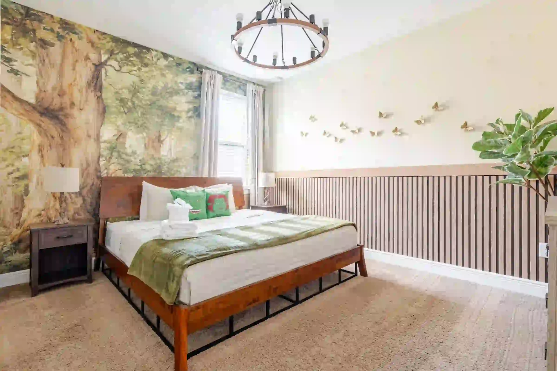 wellness retreat bedroom forest tree mural king bed orlando