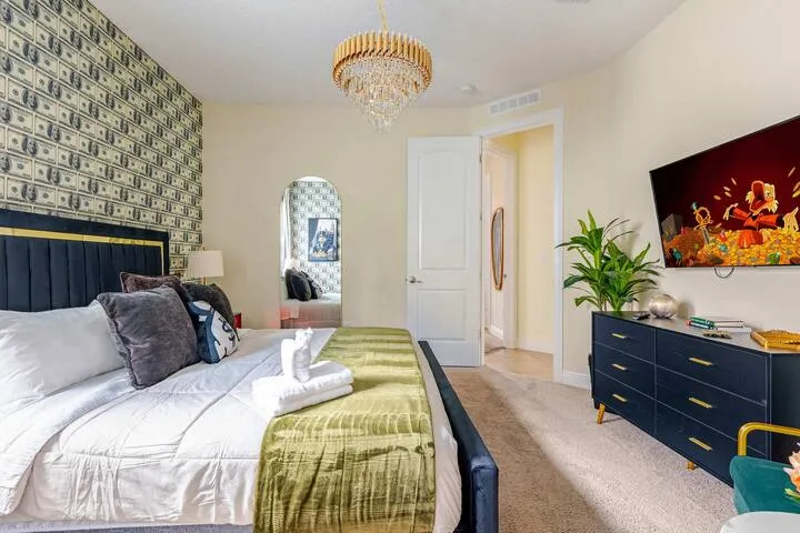 wellness retreat bedroom money theme queen bed orlando