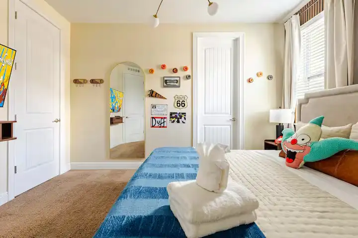 wellness retreat bedroom simpsons gallery wall towels orlando
