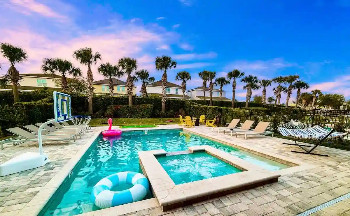 Outdoor pool and palms at an Orlando luxury villa